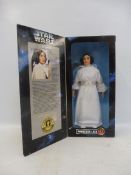 A boxed Star Wars collectors' series 12" Princess Leia figure.