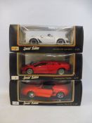 Three boxed Maisto 1:18 scale model supercars to include a Mustang Mac3.