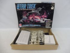 An AMT model kit, Star Trek Legendary Space Encounter.