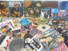 A quantity of vinyl LPs and 45s, mixed genre, to feature Beatle Rubber Soul.