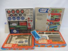 Two Marklin railway sets with accessories, and a Marklin metal gift set.