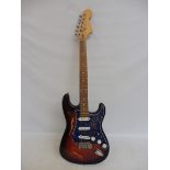 An electric guitar marked Fender Parts Castor, a guitar made up from parts of other guitars, to look