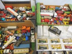 Three boxes of boxed and playworn die-cast vehicles,various makers.
