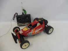 A Tamiya Bearhawks circa 1980s remote controlled car, with controller, good condition.
