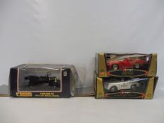 Three boxed 1:18 scale models to include Porsche 356 1964 Police car.