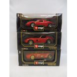 Three boxed Burago 1/18 scale Ferraris.