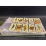 A large album of Wills cigarette cards including some early cards, 15 cards from Vanity Fair, 1st