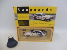 A boxed Vanguards model, signed Vince Woodman (?).