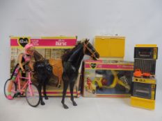 A box of assorted 1970s Sindy to include the horse, motorcycle etc.