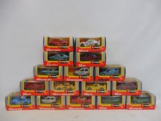 A quantity of boxed Burago 1:43 scale models.