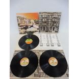 Two Led Zeppelin albums Physical Graffiti, cover and vinyl in at least VG+ condition, and House of