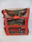 Three 1:18 scale models to include the Coca Cola delivery wagon.
