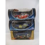 Three 1:18 scale boxed models to include Subaru Imprezza and others.