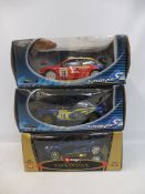 Three 1:18 scale boxed models to include Subaru Imprezza and others.
