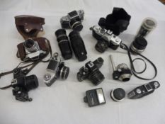 A selection of assorted camera accessories and cameras.