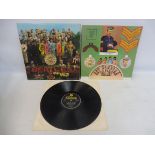 The Beatles Sgt. Pepper, 1967 Mono original vinyl in near excellent condition, cover at least VG+,