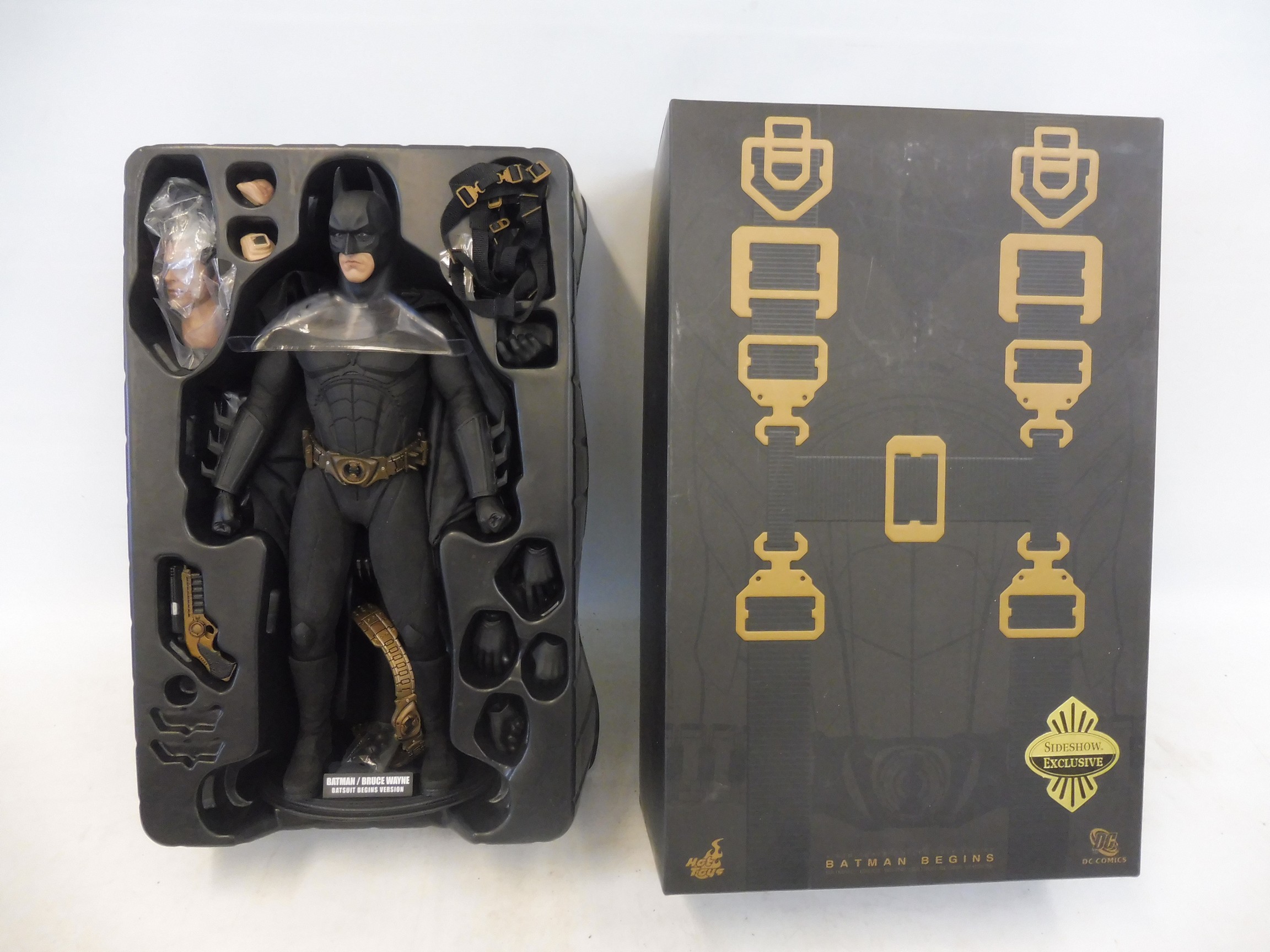 A Batman Begins DC Comics Bruce Wayne collectors' figure.