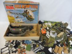 Action Man - a boxed helicopter and a quantity of accessories, guns etc.