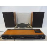 A Dual 505 record player, a Bang & Olufsen tape deck and a pair of Hacker speakers.