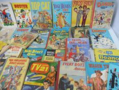 Two boxes of mainly 1950s and 1960s annuals plus a selection of wooden toys.