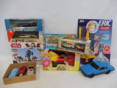 A box of mixed toys, to include Star Wars kits, die-cast vehicles, etc.
