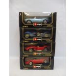 Four boxed 1/18 scale Burago models, two Bugattis, a Ferrari and a Lancia.