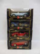 Four boxed 1/18 scale Burago models, two Bugattis, a Ferrari and a Lancia.