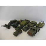 A small selection of playworn Dinky and Corgi military vehicles.