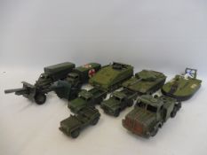 A small selection of playworn Dinky and Corgi military vehicles.