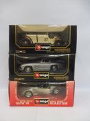 Three boxed 1/18 scale Burago models, two Mercedes and one BMW.