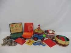 A box of mixed era toys to include Bayko, tinplate Chad Valley etc.