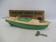 A boxed Hornby tinplate and plastic speedboat made by Meccano, box with detached end flap, model