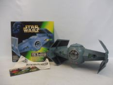 A boxed Kenner Star Wars Power of the Force Vader's Tie-Fighter, appears in excellent condition.