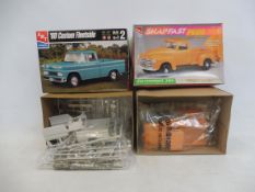Two boxed 1:25 scale AMT plastic model kits, to include a 1950 Chevy.