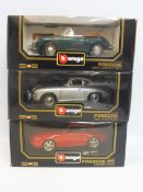 Three boxed Burago 1/18 scale models, all Porsches of different eras.