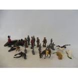 Britains and other hollowcast figures, flats, two small tanks and assorted plastic animals.