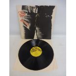 Rolling Stones Sticky Fingers, first press, cover and vinyl in at least VG+ condition, metal zip