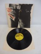 Rolling Stones Sticky Fingers, first press, cover and vinyl in at least VG+ condition, metal zip