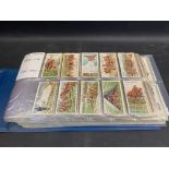 A large album of Players cigarette cards including some unusual sets, noted are Army Life October