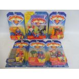 Five Kenner Superman carded figure and action sets, generally good condition.