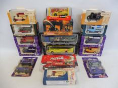A selection of boxed Matchbox, Corgi and others to include luxury coaches and fire tenders.
