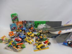 A quantity of bagged Lego of different eras.