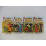 A set of four McFarlane Toys, The Beatles Yellow Submarine, George, Ringo, Paul and John,