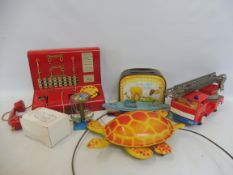 A small tray of various period tinplate toys to include a Mobo turtle etc.