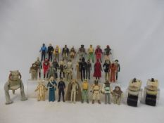 33 original Star Wars figures, to include Darth Vader, Luke Skywalker, Ewoks and many others.