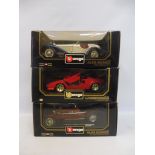 Three boxed 1/18 scale Burago models, all Italian supercars, two Alfa Romeos and a Lamborghini.