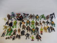 A selection of plastic tv and film related figures.