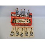 A very rare Beatles shop display trade pack with an original set of 50 badges on their cards, made