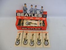 A very rare Beatles shop display trade pack with an original set of 50 badges on their cards, made