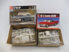 Two boxed 1:25 scale AMT plastic model kits, to include a 1957 Belle Air.
